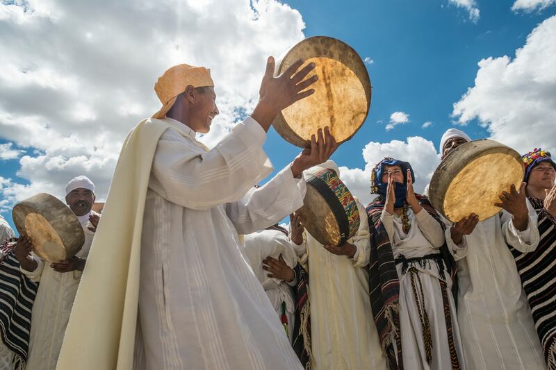 Helping to preserve culture and language, Amazigh musicians and dancers entertain at the Imilchil, Morocco Marriage and Betrothal Festival. Getty Images