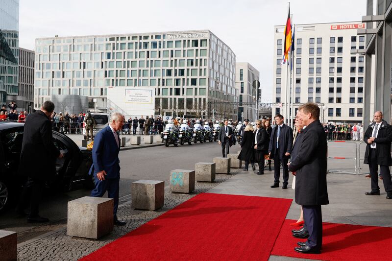 German President Frank-Walter Steinmeier, and Richard Lutz, chairman of rail company Deutsche Bahn AG, welcome King Charles for his departure at the main train station in Berlin. Reuters