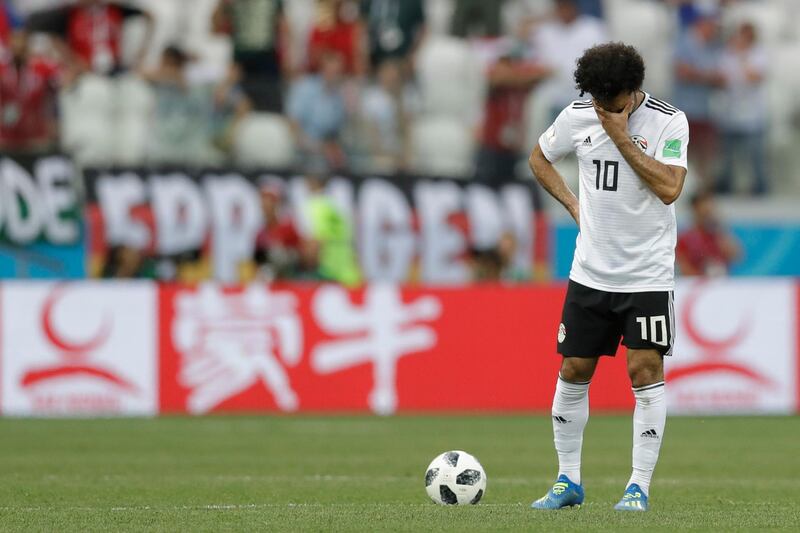 Egypt's Mohamed Salah reacts after Saudi Arabia's Salem Al Dawsari scored his side's second goal during the two teams' Group A match. AP