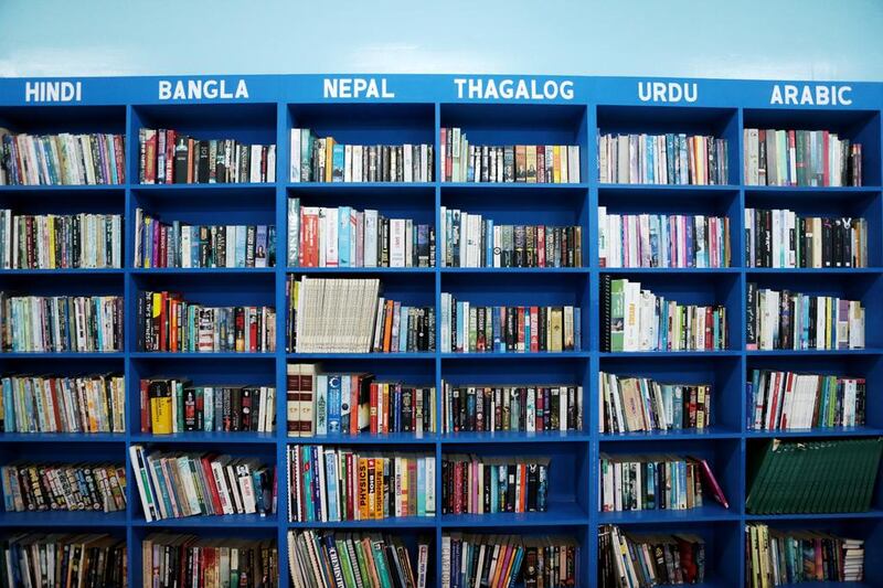 Books in the Saadiyat Accommodation Village library are categorized by language. Christopher Pike / The National