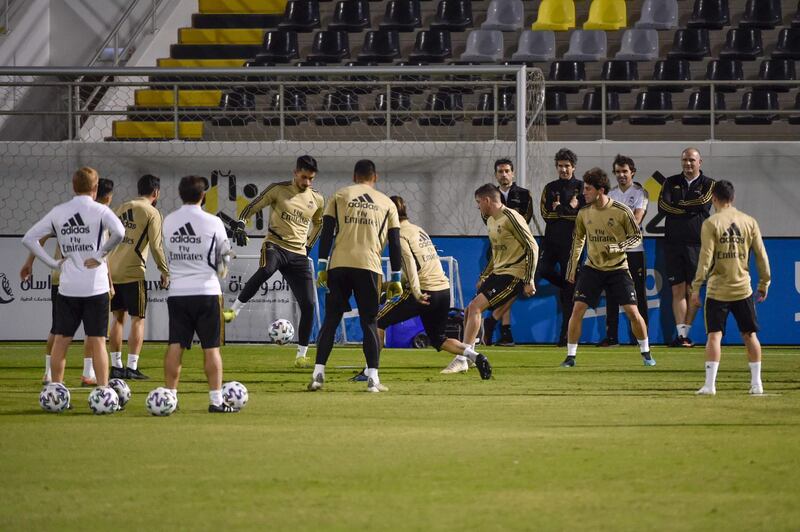 Real Madrid players conduct drills during a training session in Jeddah. AFP