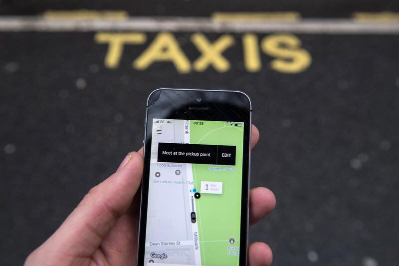 An Uber Technologies Inc. ride-hailing service smartphone app displays a road map in this arranged photograph at a taxi rank in London, U.K., on Friday, Dec. 22, 2017. Uber will be regulated in European Union countries as a transport company after the bloc's top court rejected its claim to be a digital service provider, a decision that could increase legal risks for other gig-economy companies including Airbnb. Photographer: Chris J. Ratcliffe/Bloomberg