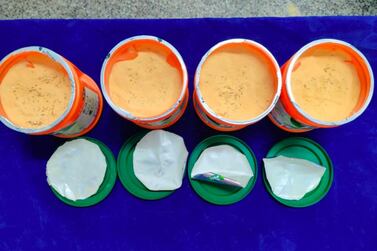 Authorities in Chennai, India, intercepted 2.5kg of gold granules hidden in four containers of instant orange drink, Tang on Monday, May 10. Courtesy: Chennai Customs 