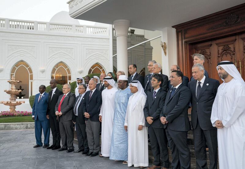 ABU DHABI, UNITED ARAB EMIRATES - December 17, 2018: HH Sheikh Mohamed bin Zayed Al Nahyan, Crown Prince of Abu Dhabi and Deputy Supreme Commander of the UAE Armed Forces (front row 7th R) and HE Ibrahima Kassory Fofana, Prime Minister of Guinea (front row 6th R), stand for a photograph with members of the 1st Arab Digital Economy Conference, during a Sea Palace barza.

( Mohamed Al Hammadi / Ministry of Presidential Affairs )
---