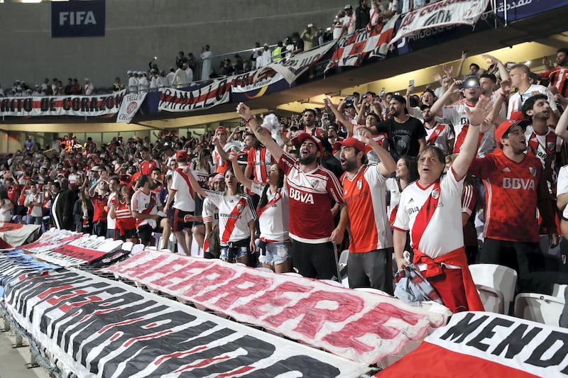 Al Ain, United Arab Emirates - December 18, 2018: Fans cheer before the game between River Plate and Al Ain in the Fifa Club World Cup. Tuesday the 18th of December 2018 at the Hazza Bin Zayed Stadium, Al Ain. Chris Whiteoak / The National