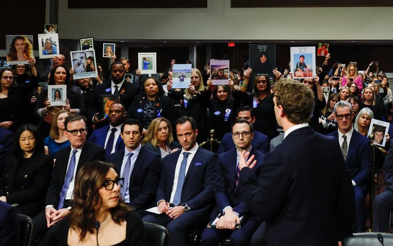 Meta's CEO Mark Zuckerberg stands and faces the audience as he testifies during the Senate Judiciary Committee hearing on online child sexual exploitation at the U. S.  Capitol in Washington, U. S. , January 31, 2024.  REUTERS / Evelyn Hockstein