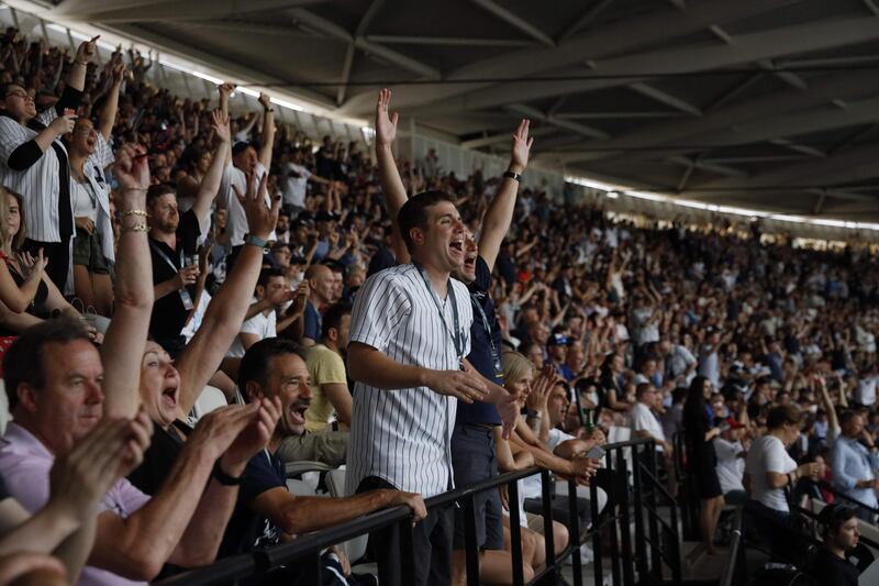 Baseball fans look on during the first of a two-game series between the New York Yankees and the Boston Red Sox at London Stadium in Queen Elizabeth Olympic Park, east London. As Major League Baseball prepares to make history in London, New York Yankees manager Aaron Boone and Boston Red Sox coach Alex Cora are united in their desire to make the ground-breaking trip memorable on and off the field. AFP