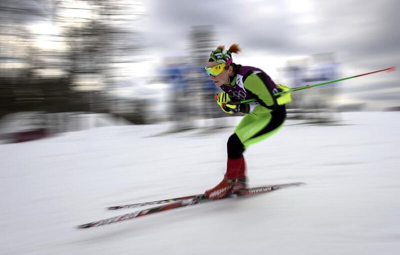 Cross country athlete Valiantsina Kaminskaya of Belarus skis during a practice session on Monday. Odd Andersen / AFP