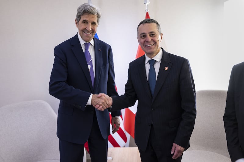 Ignazio Cassis, President of the Swiss Confederation and federal councillor, welcomes John Kerry, US special presidential envoy for climate, in Davos. EPA