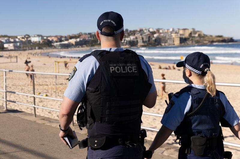 Police patrol at Bondi Beach in Sydney, Australia. Lockdown restrictions have come into effect across Greater Sydney, the Blue Mountains, the Central Coast and Wollongong as NSW health authorities work to contain a growing COVID-19 cluster. From 6pm on Saturday, all residents in areas subject to stay-at-home orders are only permitted to leave their homes for essential reasons, including purchasing essential goods, accessing or providing care/healthcare, work, education and exercise. The restrictions will remain in place until midnight on Friday 9 July. Getty Images