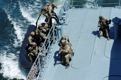 Special forces conduct boarding drills during a joint Romanian, British and US maritime exercise. Reuters