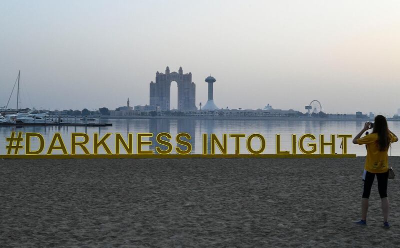 Abu Dhabi, United Arab Emirates - Photo opportunity at the Darkness into Light walk, Emirates Palace. Khushnum Bhandari for The National