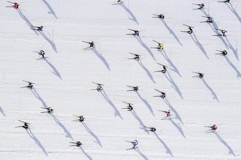 Thousands of sportsmen and women on their way from Maloya to S-Chanf as they participate in the 51st annual Engadin skiing marathon, in St. Moritz, Switzerland. EPA