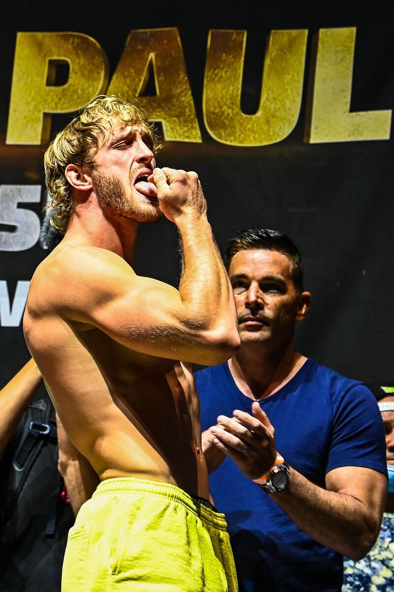 YouTube personality Logan Paul gestures during the weigh-in for his fight against former world welterweight champion Floyd Mayweather in Miami. AFP