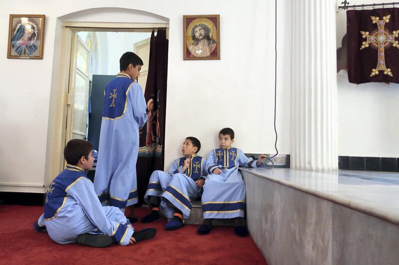 Boys mill around inside one of the old churches. Jenny Gustafsson