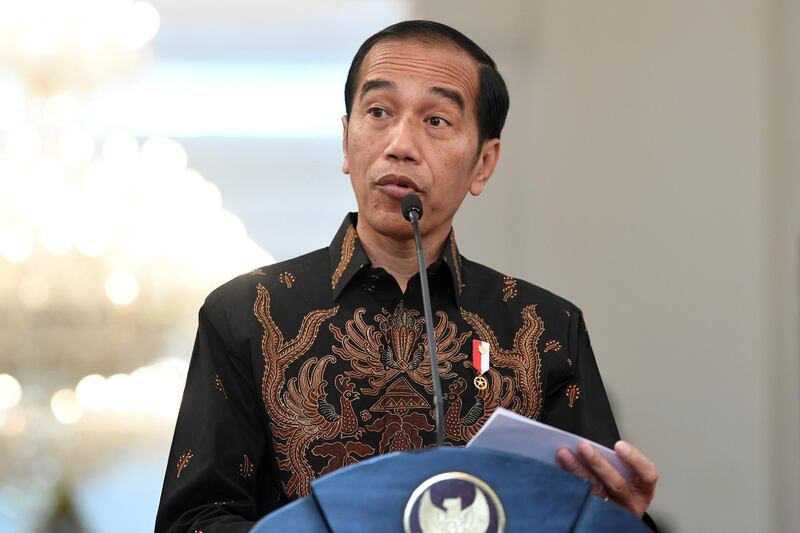 Indonesian President Joko Widodo speaks to the media about the deaths of construction workers after a shooting in the country's easternmost province of Papua, at the palace in Jakarta, Indonesia December 5, 2018 in this photo taken by Antara Foto.  Antara Foto/Wahyu Putro A/via REUTERS  ATTENTION EDITORS - THIS IMAGE WAS PROVIDED BY A THIRD PARTY. MANDATORY CREDIT. INDONESIA OUT.