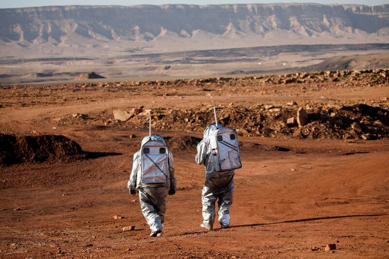 Scientists at the Ramon Crater in the desert of southern Israel. A team of five men and one woman have begun simulating what it will be like to live for about a month on Mars. Reuters