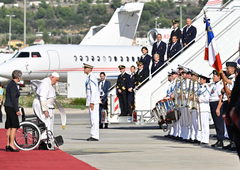 The Pope is officially welcomed at Marseille Airport. EPA