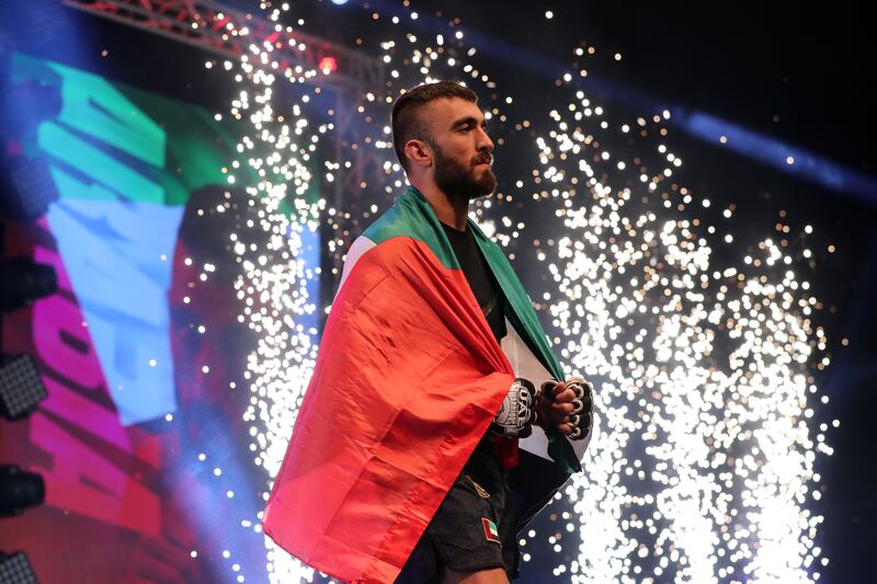 Mohammad Yahya makes his way into the arena for his UAE Warriors Arabia Lightweight title defence against Mohamed El Jaghdal. Chris Whiteoak / The National
