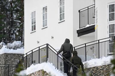 Witnesses spoke of a pre-dawn raid in a Stockholm suburb in which two people were arrested. AP 