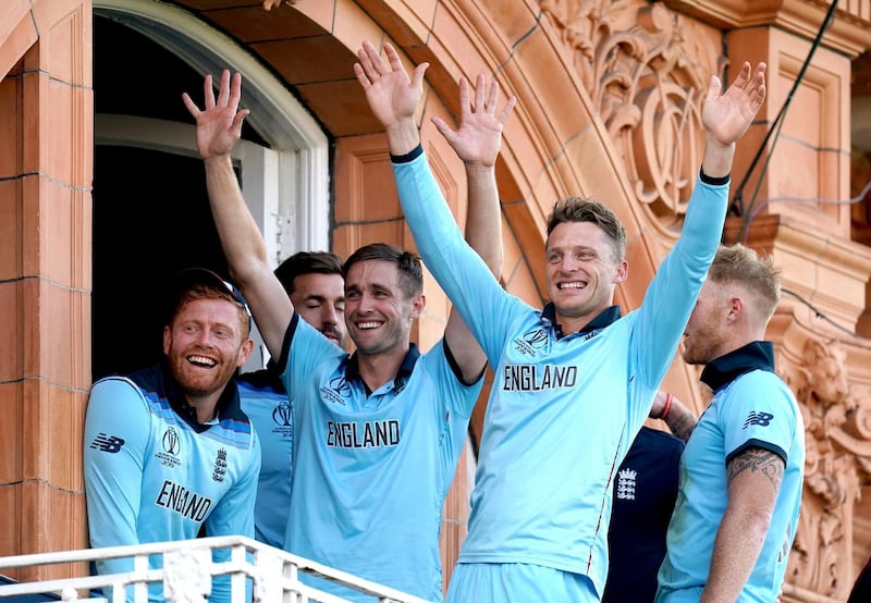 England players celebrate on the balcony at Lord's. PA