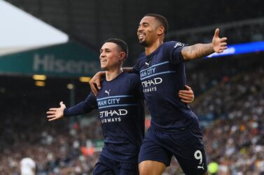 LEEDS, ENGLAND - APRIL 30: Gabriel Jesus of Manchester City celebrates with team mate Phil Foden after scoring their sides third goal during the Premier League match between Leeds United and Manchester City at Elland Road on April 30, 2022 in Leeds, England. (Photo by Michael Regan / Getty Images)