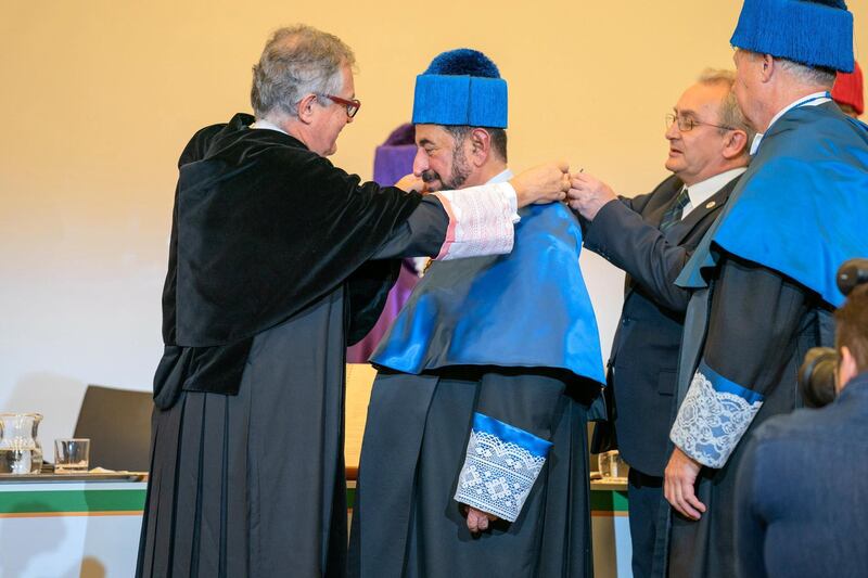 Sheikh Dr Sultan bin Muhammad Al Qasimi receives his honorary doctorate from Universidad Autónoma de Madrid's dean. Courtesy Sharjah Media Office