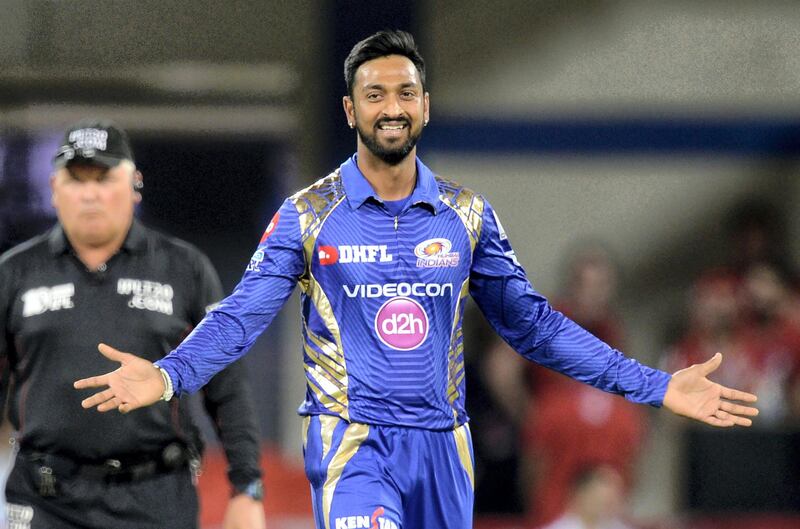 Mumbai Indians cricketer Krunal Pandya celebrates after taking the wicket of Kings XI Punjab batsman Wriddhiman Saha during the 2017 Indian Premier League (IPL) Twenty20 cricket match between Kings XI Punjab and Mumbai Indians at The Holkar Cricket Stadium in Indore on April 20, 2017. ------IMAGE RESTRICTED TO EDITORIAL USE - STRICTLY NO COMMERCIAL USE----- / GETTYOUT------ / AFP PHOTO / PUNIT PARANJPE / ----IMAGE RESTRICTED TO EDITORIAL USE - STRICTLY NO COMMERCIAL USE----- / GETTYOUT