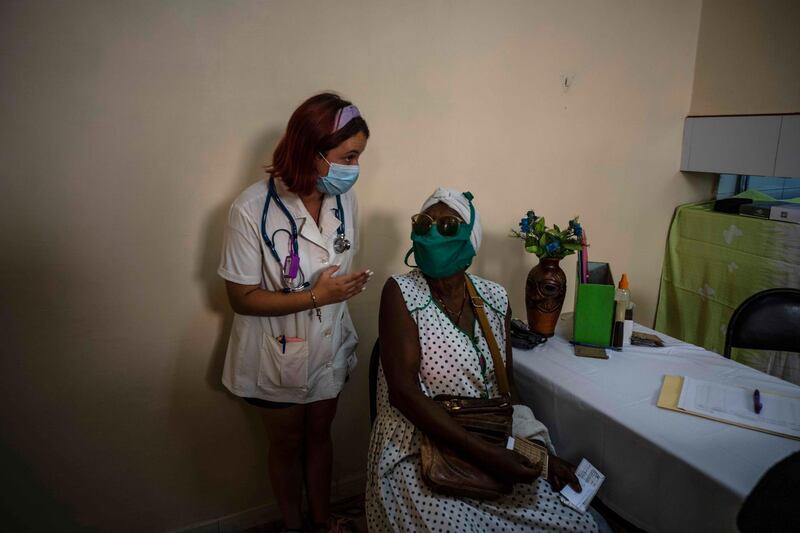 A woman waits for her dose of the Cuban Abdala Covid-19 vaccine In Havana, Cuba. AP Photo