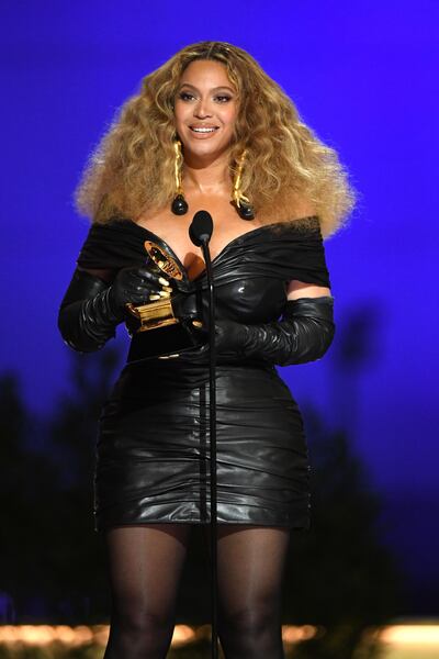 epa09075295 A handout photo made available by The Recording Academy shows Beyonce accepting the Best R&B Performance award for 'Black Parade' onstage during the 63rd Annual Grammy Awards ceremony at the Los Angeles Convention Center, in Los Angeles, California, USA, 14 March 2021.  EPA/Kevin Winter / HANDOUT ATTENTION EDITORS: IMAGE TO BE USED ONLY IN RELATION TO THE STATED EVENT / HANDOUT EDITORIAL USE ONLY/NO SALES/NO ARCHIVES