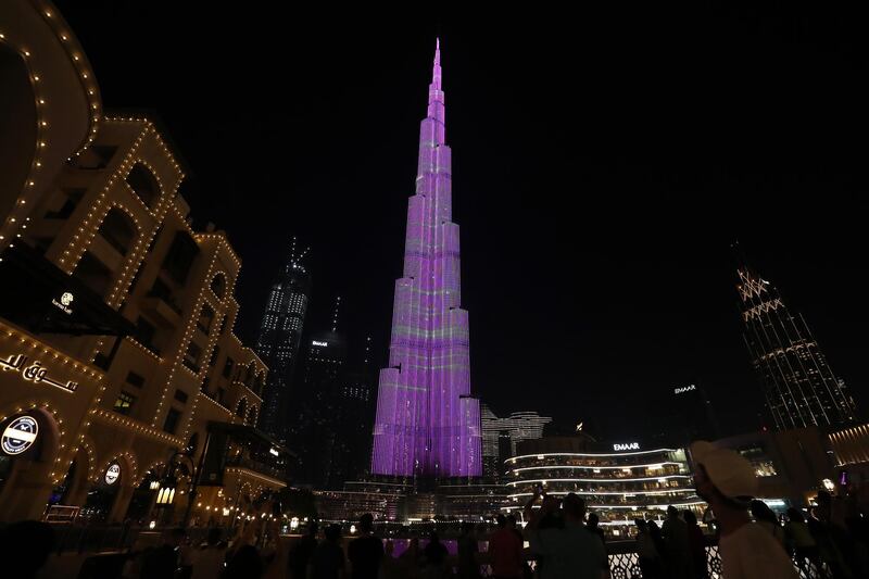 Burj Khalifa and Dubai Fountain lit up with new Eid light show in Dubai on May 11,2021. Pawan Singh / The National