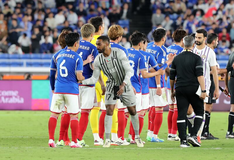Al Ain keeper Khalid Essa shakes hands with the Yokohama F Marinos players at full time in the Japanese side's 2-1 victory in the AFC Champions League final first leg at the Yokohama International Stadium, on Saturday, May 11, 2024. Chris Whiteoak / The National