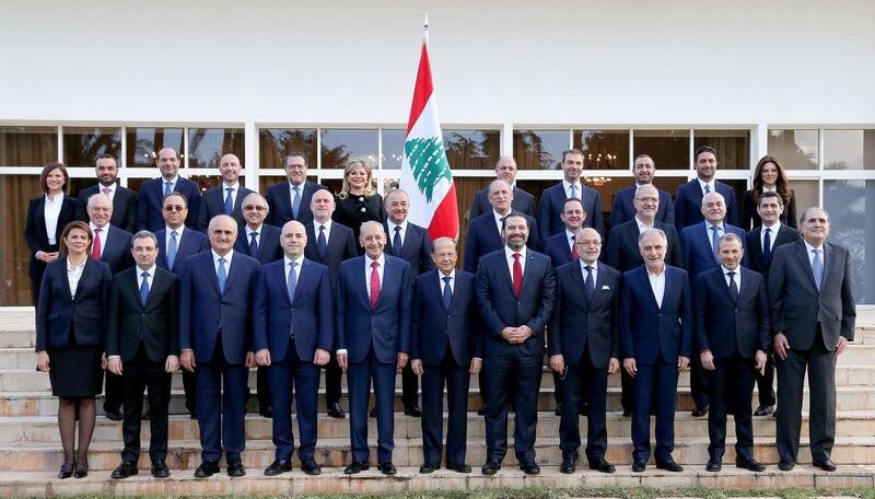 epa07338382 A handout photo made available by Lebanese official photography agency Dalati Nohra shows on (front line) Lebanese President Michel Aoun (C), Lebanese Prime Minister Saad al-Hariri (C-R) and Lebanese parliament speaker Nabih Berri (C-L) with new Lebanese Ministers pose during family picture at the presidential palace in Baabda east of Beirut, Lebanon, 02 February 2019. Lebanon formed a new government ending nine months of wrangling and deadlock, the government headed by Saad Hariri who has Western and Arabic backing. Hezbollah emerged stronger since the parliamentary election May 2019, held positions in three ministries including the Ministry of Health.  EPA/DALATI NOHRA HANDOUT  HANDOUT EDITORIAL USE ONLY/NO SALES