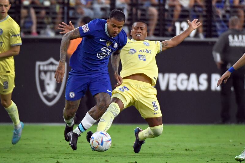 Chelsea midfielder Kenedy and Club America midfielder Pedro Aquino battle for the ball. AP