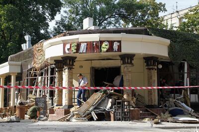 epa06989168 Local policemen investigate the scene of an explosion at the 'Separ' cafe in downtown Donetsk, Ukraine, 01 September 2018. According to reports, the chief of the self-proclaimed Donetsk People's Republic, Alexander Zakharchenko, reportedly died in a local hospital following an explosion in the 'Separ' restaurant on 31 August in the pro-Russian rebels stronghold of Donetsk.  EPA/ALEXANDER ERMOCHENKO