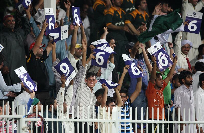 SHARJAH , UNITED ARAB EMIRATES Ð Aug 28 : Crowd watching the 1st one day international cricket match between Pakistan vs Australia at Sharjah Cricket Stadium in Sharjah. ( Pawan Singh / The National ) For  Sports. Story Paul and Ahmed