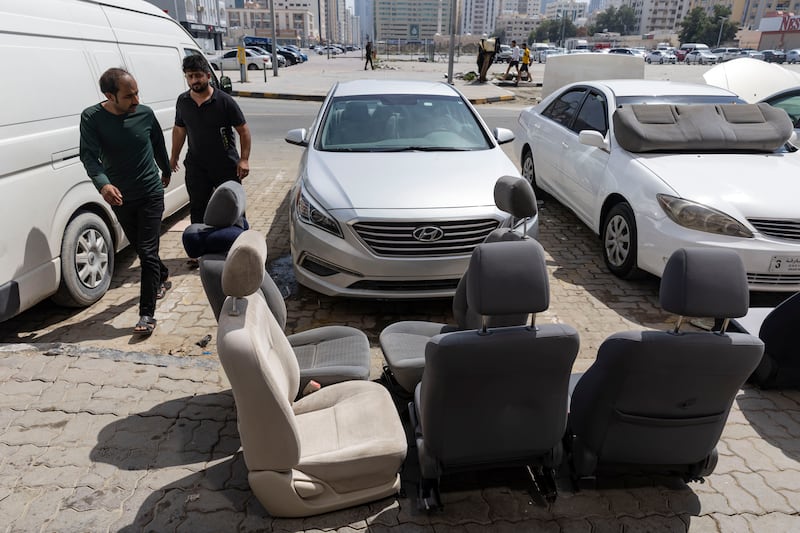 Car parts are left out to dry in the sun. Thousands of vehicles - possibly tens of thousands - are thought to have been damaged or written off in Dubai and Sharjah.
