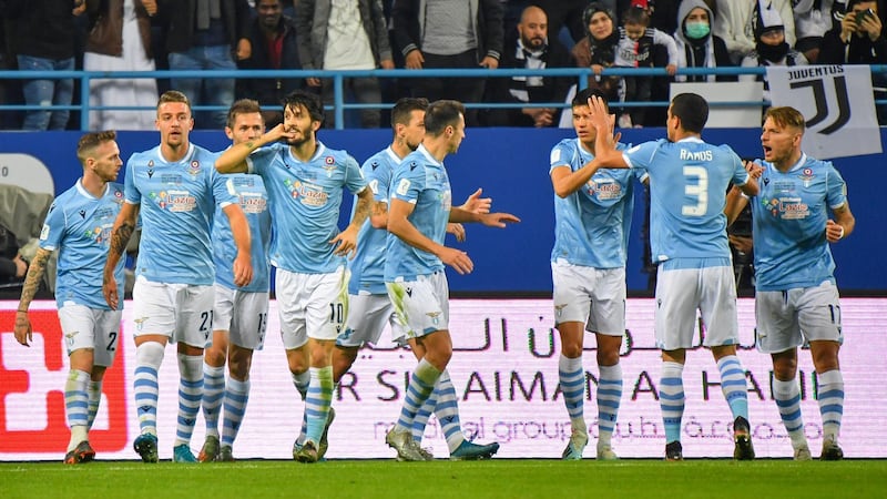Lazio's players celebrate their opening goal. AFP