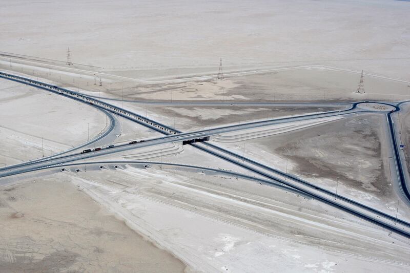 ABU DHABI, UNITED ARAB EMIRATES - June 24, 2008: An aerial photograph of a highway E11 junction in the Western Region of Abu Dhabi.
( Ryan Carter / The National ) *** Local Caption ***  RC002-E11Aerial.JPG