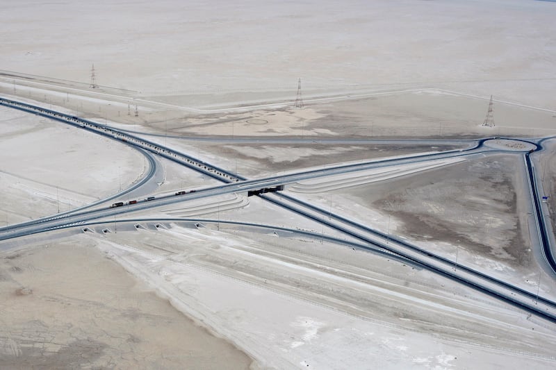 ABU DHABI, UNITED ARAB EMIRATES - June 24, 2008: An aerial photograph of a highway E11 junction in the Western Region of Abu Dhabi.( Ryan Carter / The National ) *** Local Caption ***  RC002-E11Aerial.JPG