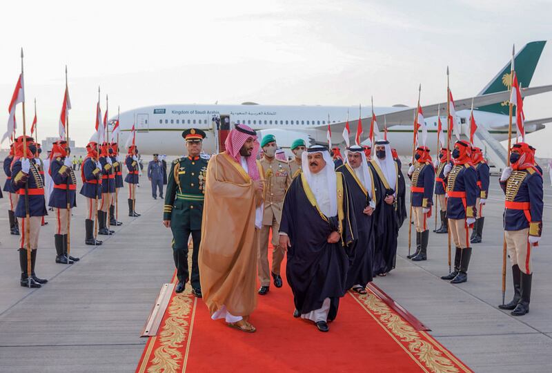 King Hamad greets Prince Mohammed on his arrival at Sakhir Airbase, near Bahrain's capital Manama. AFP