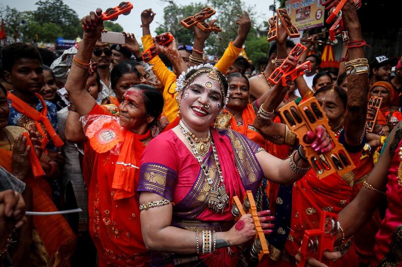 Hindus dance as they take part in the annual Rath Yatra, or chariot procession, in Ahmedabad, India. Reuters