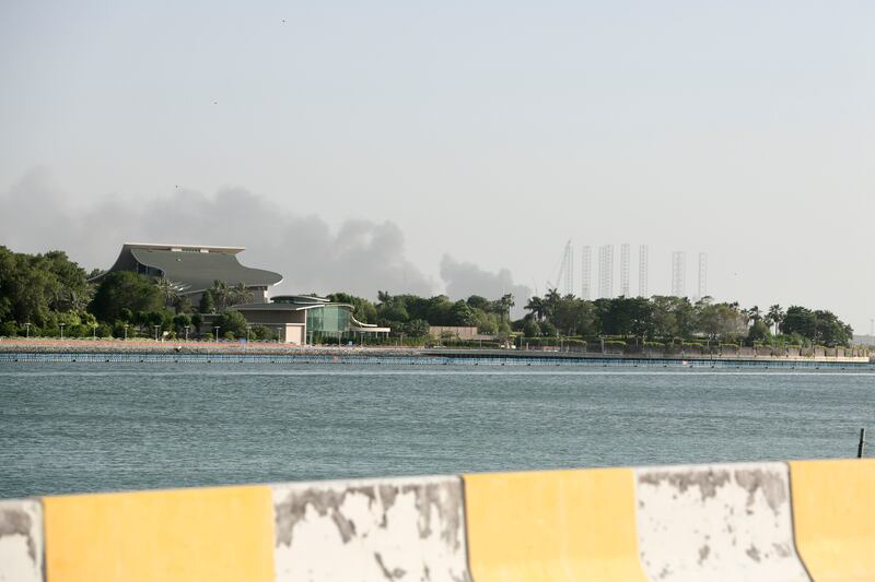 Smoke could be seen from Khor Al Maqta waterway on Wednesday evening. The National