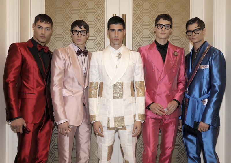 Models show off the collection's colourful menswear elements. Courtesy Dolce & Gabbana