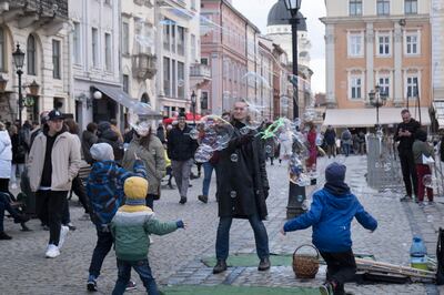 Children play in the streets of Lviv. Photo: Oliver Raw
