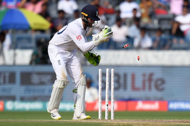 England wicketkeeper Ben Foakes runs out India's Ravichandran Ashwin for one, AFP