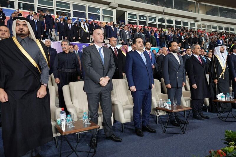 Iraqi Prime Minister Mohammed Shia Al Sudani, centre, at Basra International Stadium, with Fifa president Gianni Infantino to his right. Mr Al Sudani opened the tournament and welcomed the eight teams and their fans. Photo: Iraqi Prime Minister Media Office