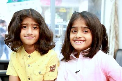 Rishi and Rohan grew their hair for 18 months before having a close shave for charity