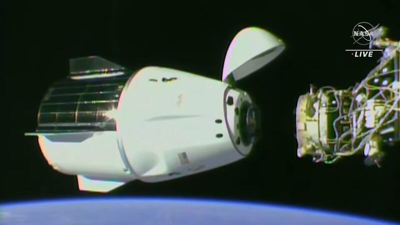 Dragon gets closer to the docking port on the ISS.