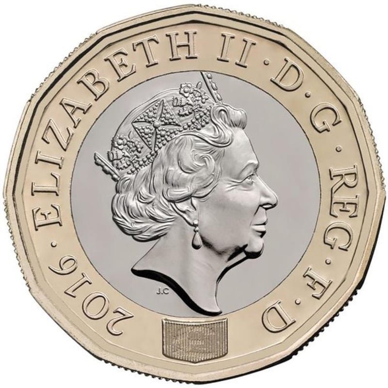 The new 12-sided British one pound coin will enter circulation on March 28, 2017. HM Treasury/Handout/EPA